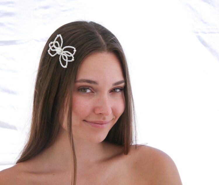 bow made of pearls on hair pin vintage beaded bow